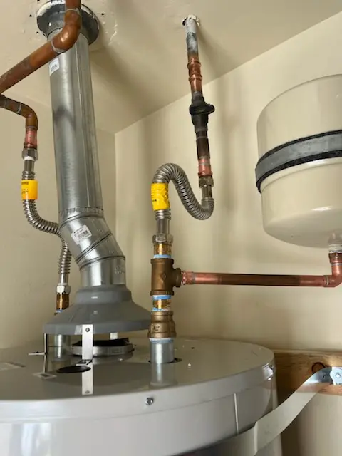 Water heater installation and plumbing repair in Flax Hill Elderly Housing